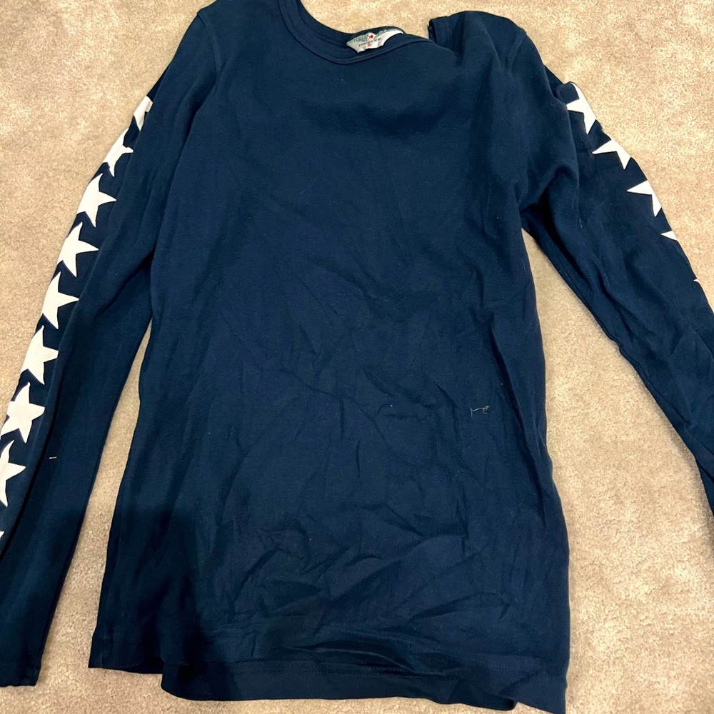 Women long sleeve hard tail tee with white stars going down the sleeve, size xs